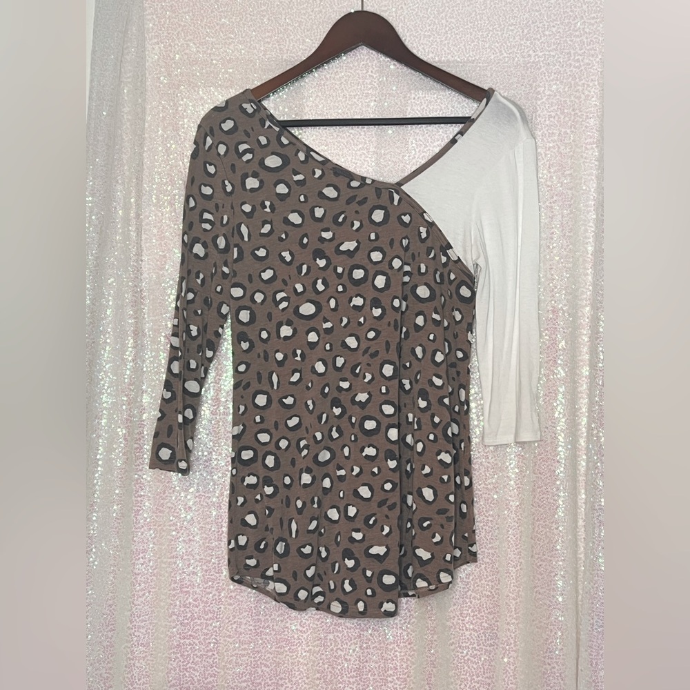 Leopard print with white color block sleeve top.